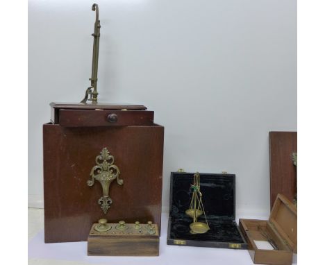 A set of apothecary scales, a set of weights and other scales
