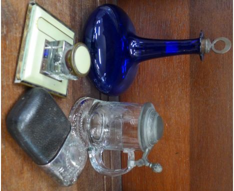 A 19th Century hip flask with plated top, a pen stand inkwell, a Bristol blue decanter with 'whisky' stopper and a German etc