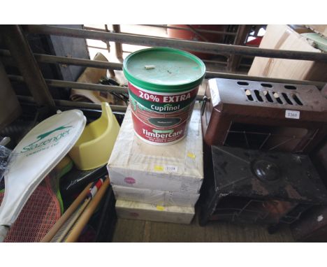 Three packets of glazed ceramic wall and floor tiles and a bucket of Cuprinol Timber care in Woodland Green 