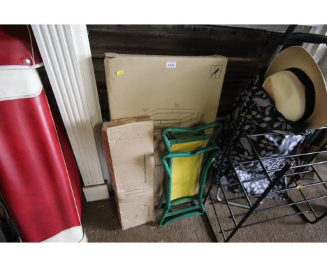 An oak effect lap top desk in original box together, a pair of Home Cinema speaker stands in original box and a metal framed 