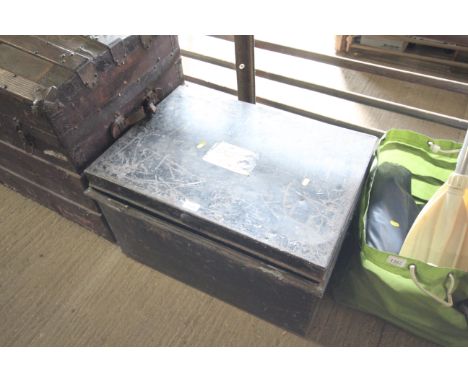 A metal tin trunk, lid AF
