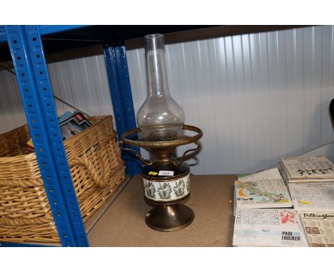 An oil lamp converted to electricity, sold as collectors item