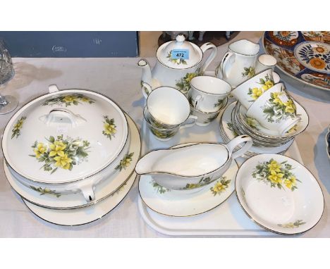 A yellow floral fine bone china, part dinner and tea service. 