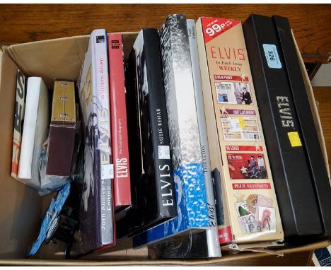 A selection of Elvis memorabilia and books 