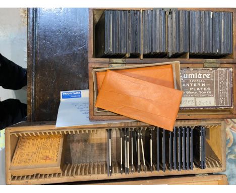 A series of French stereo photographs and viewer; 2 boxes of lantern slide photos with letter suggesting provenance. 