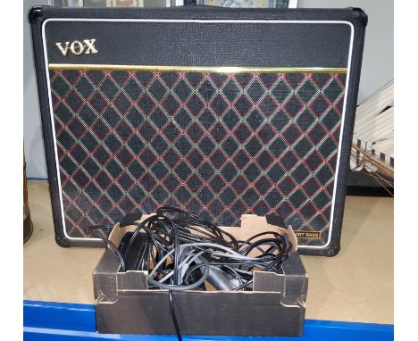 A multimedia wireless keyboard; a Vox amplifier; microphones; etc. 