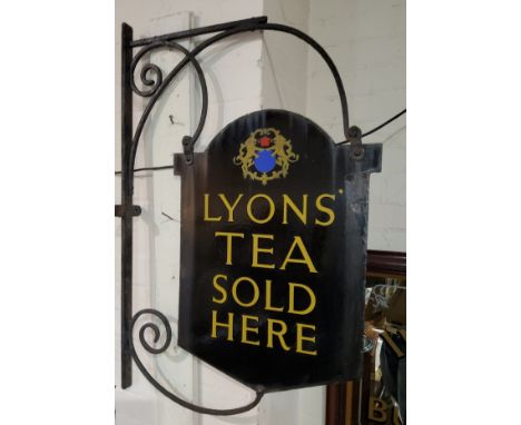 A LYONS TEA enamelled sign on original wrought iron bracket (double sided) In reasonable condition on both sides