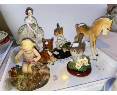 A Royal Worcester group 'A Woodland Dance' and other figures and animals 
