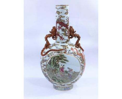 A Chinese Moon flask shaped vase decorated with polychrome panels of traditional scenes, surrounded by different coloured dra