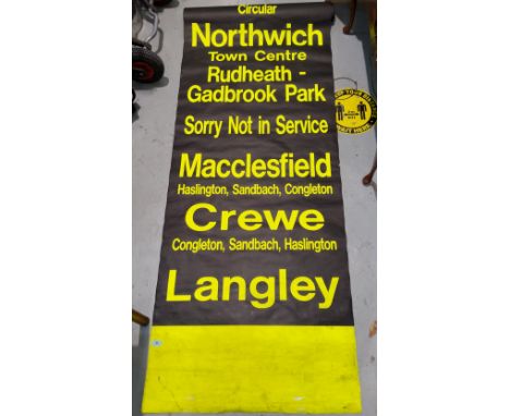 A fluorescent rolling bus destination roller for mid-Cheshire, Macclesfield etc 