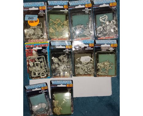 Eight 1980's Games Workshop Citadel Miniatures 'Warhammer 40,000' seven from 'Rogue Trader' and one 'Space Marine set, RT510 