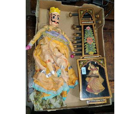A sitar, painted and lacquered; an oriental doll.INDIAN STRING MUSICAL INSTRUMENTSARANGI  ALONG WITH INDIAN STRING PUPPET ( K