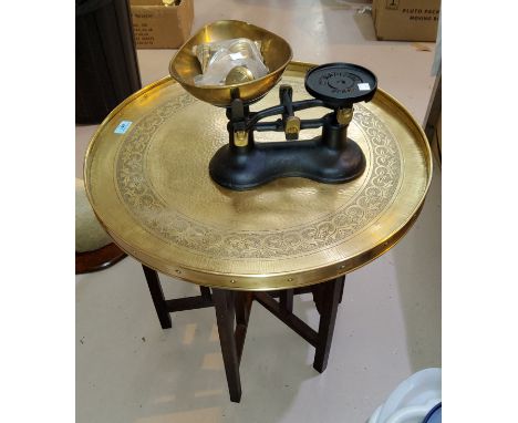 Two occasional tables with brass tops; a set of vintage scales; brassware 