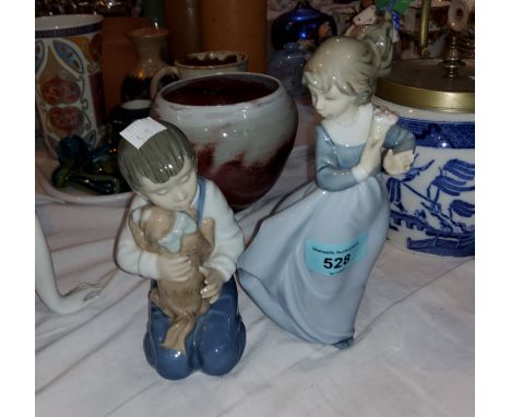 2 Nao figures , boy with puppy and girl with flower and decorative pottery 