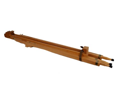 A wooden artist travelling easel.