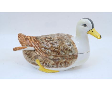 A Portuguese tureen and cover in the form of a duck, 20th century, by Faiancas Belo, with matching ladle, 35cm widePlease ref