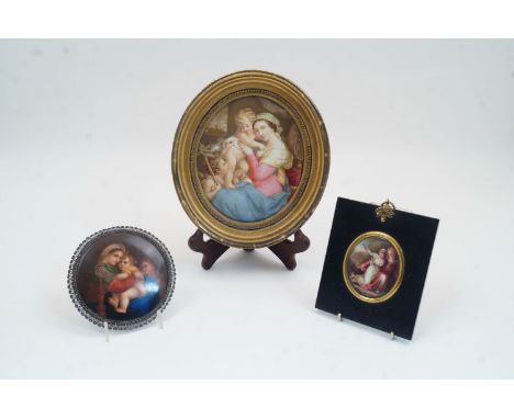 Two Continental enamel plaques of the Virgin and Child with John the Baptist, 19th century, one after Raphael, in a circular 