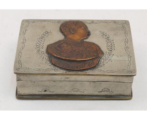 A Thai white metal rectangular box, 20th century, the hinged cover set with a copper plaque, depicting a king of Thailand, 13