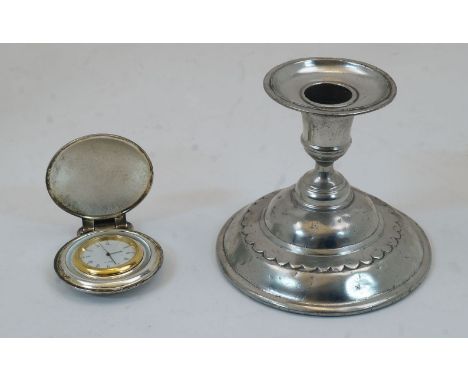 A French dwarf pewter candlestick, with urn sconce on spreading stepped circular base, stamped to underside, 10cm high, toget