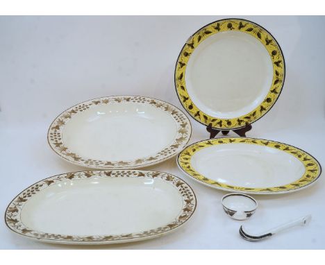 A group of five enamelled creamware dinner wares, early 19th century, impressed marks, comprising: a pair of large plates wit