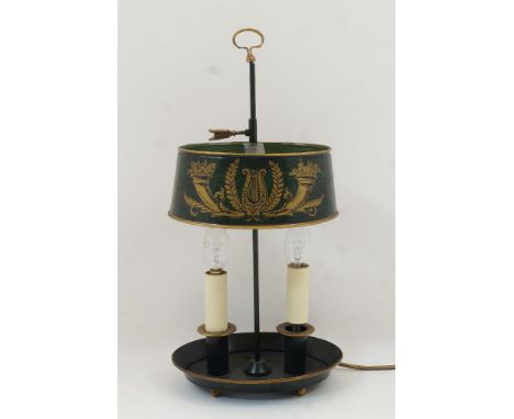 A modern tole peinte twin-light bouillotte lamp, of oval form, the adjustable shade with cornucopia decoration, 46cm highIt i
