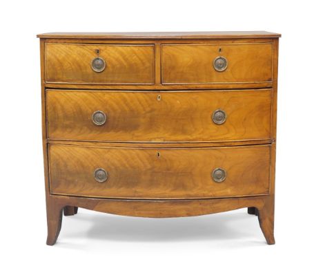 A Regency mahogany bow front chest of drawers, two short over two long, raised on out swept feet, 94cm high, 103cm wide, 50cm