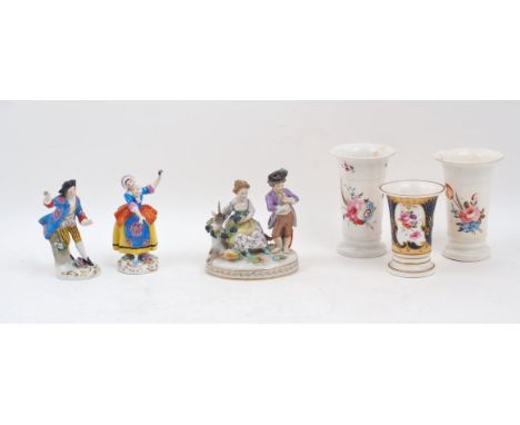 A Vienna porcelain figure group of a piper with a girl and goat by his side, 19th century, blue underglaze mark to the unders