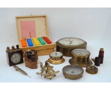 Two English brass bulkhead ship's clocks, one Sestrel example by Henry Browne & Son Ltd, 14.5cm diameter, the other one unmar