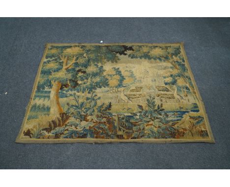 A verdure tapestry fragment, late 18th/early 19th century, depicting two exotic birds in front of a formal garden and chateau