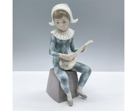 Glossy finish; Lladro backstamp. Artist: Francisco CatalaIssued: 1980 - 1985Dimensions: 3.5''L x 4''W x 8.5''HManufacturer: L