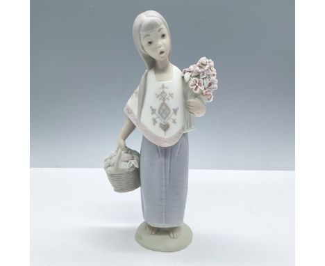 Matte finish; Lladro backstamp. Artist: Vicente MartinezIssued: 1969 - 1980Dimensions: 2.25''L x 4''W x 8.25''HManufacturer: 