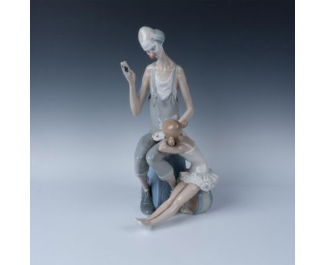 Glossy finish; Lladro backstamp. Artist: Salvador FurioIssued: 1969 - 1985Dimensions: 9.25''L x 8''W x 16''HManufacturer: Lla