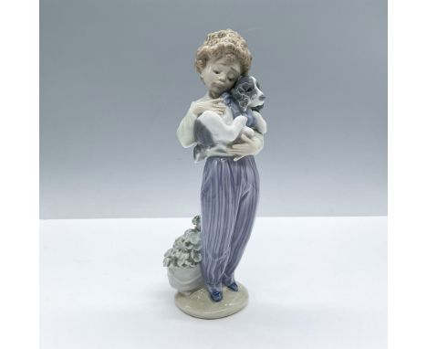 Glossy finish; Lladro backstamp. Includes the original box, dimensions: 5.25''L x 10.75''W x 5''H. Artist: Antonio RamosIssue