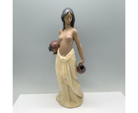 Gres finish; Lladro backstamp. Artist: Antonio RamosIssued: 1995Dimensions: 14.25"H x 6"WManufacturer: LladroCountry of Origi