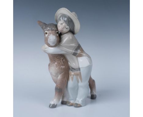 Glossy finish; Lladro backstamp. Includes the original box, dimensions: 7.5''L x 11.5''W x 6''H. Artist: Juan HuertaIssued: 1