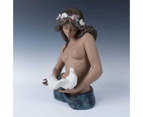 Hand painted figure of a beauty wearing a floral crown. She is shown holding a dove on her hand. Lladro backstamp. The dimens