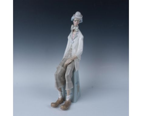 Glossy finish; Lladro backstamp. Artist: Salvador FurioIssued: 1969 - 1993Dimensions: 7.5''L x 5''W x 18''HManufacturer: Llad