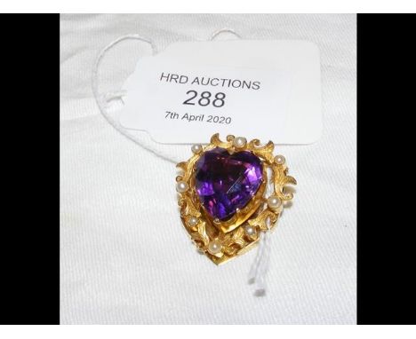 A lady's amethyst? and seed pearl clip  CONDITION REPORTBy our judgement, condition of lot is good- some signs of wear but ph