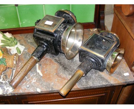 A 48cm antique coaching lamp, together with a smaller ditto 