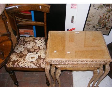 A nest of three light walnut occasional tables and a side chair