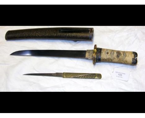 An antique Japanese Tanto with 24cm long blade, having decorative Menuki and lacquered scabbard with signed Kogatana CONDITIO