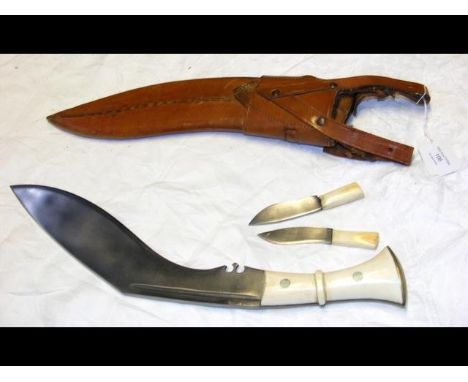 An old kukri with ivory grip and leather scabbard CONDITION REPORTBlade length is 32cm.Condition is as seen in additional ima