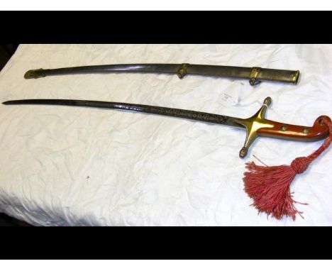 An antique Mameluke sword by Wilkinson, having engraved blade and metal scabbard - 98cm long CONDITION REPORTSee additional i