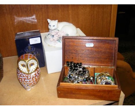 A Royal Crown Derby owl in the company of a Chessell Pottery cat and a trinket box of costume jewellery