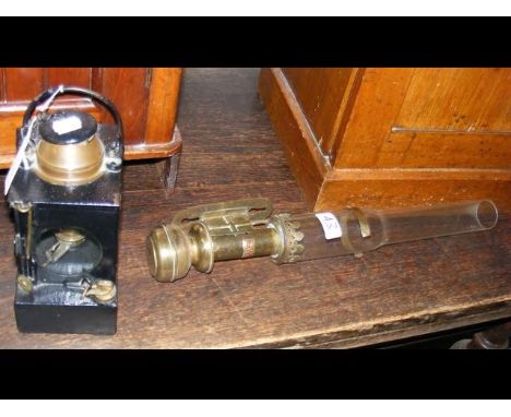 A railway Station Master's lamp, together with a GWR marked interior carriage lamp 