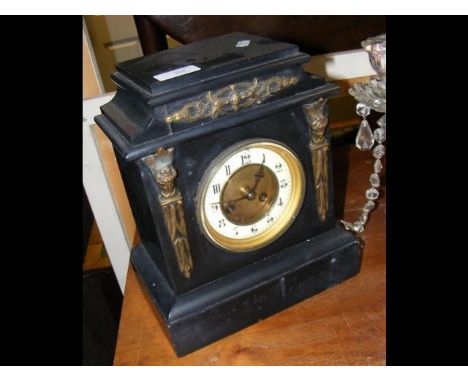 A slate mantel clock 