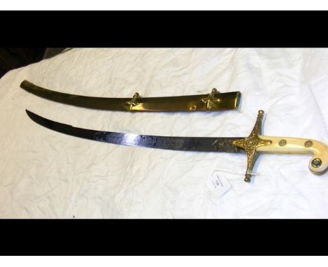 An antique Mameluke sword with engraved blade and ivory grip - 93cm long - with metal scabbard CONDITION REPORTThe sword is s