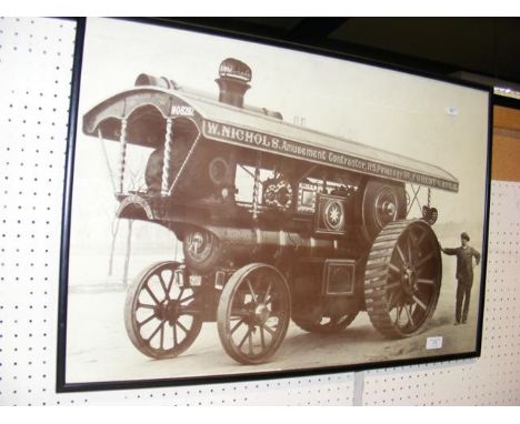 A reproduction photograph of an old steam engine 