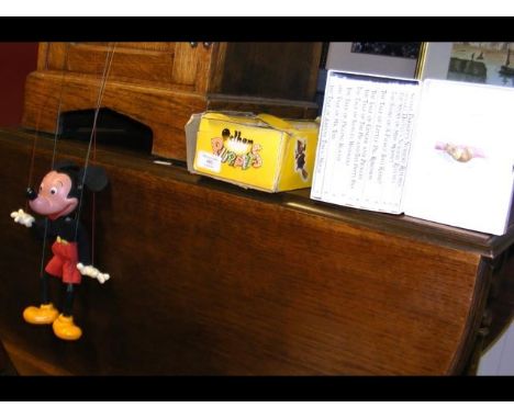 A Pelham Puppet of Mickey Mouse, together with a cased set of Beatrix Potter books