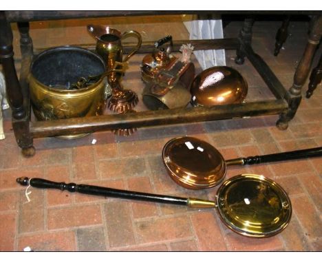 Two antique warming pans, together with a modern cuckoo clock  